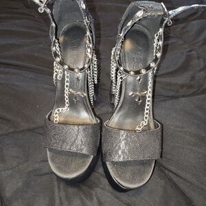 Dolls Kill Black Platforms with charms. Corset Look On Back Of The Heels.